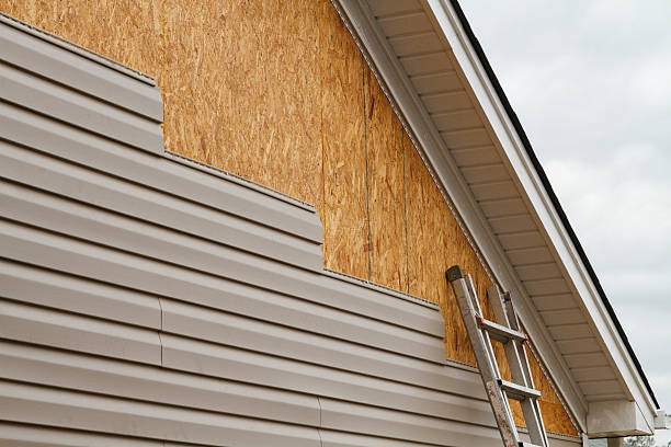 Professional Siding Contractor technician working in Providence Forge, VA